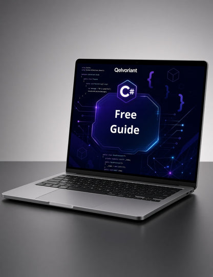 A silver laptop on a dark surface displaying a digital cover for a 'C# Free Guide' by Qelvoriant